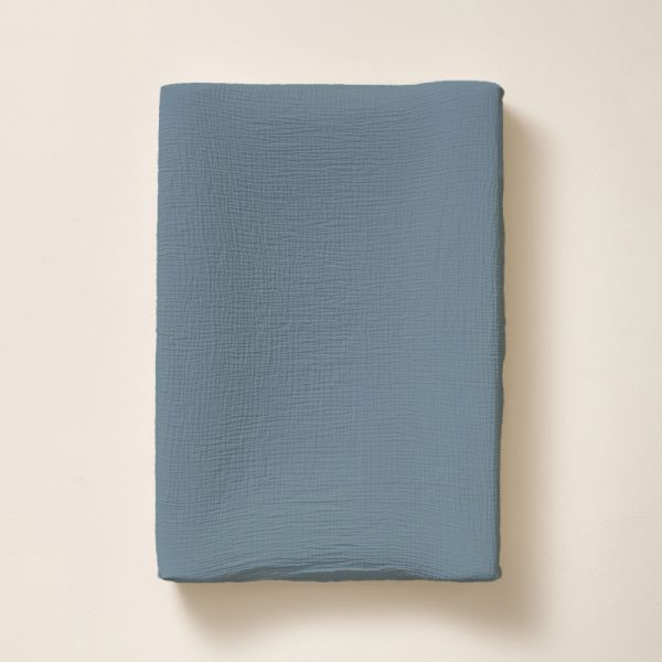 Changing pad cover in 50x70 in denim blue made from muslin organic cotton from Petite Amélie