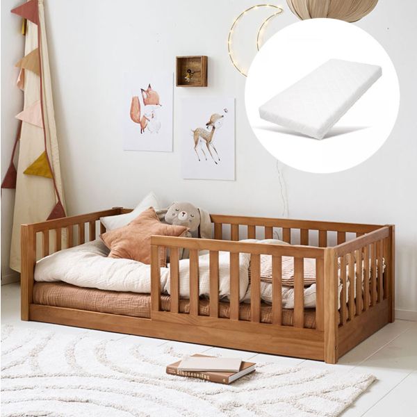 Toddler floor bed Nid in walnut with mattress and size of 70x140 cm from Petite Amélie