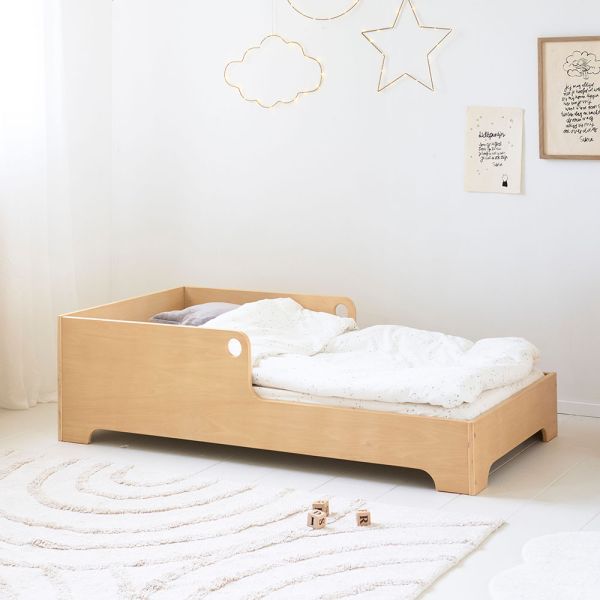 Montessori toddler bed with natural finish from Petite Amélie