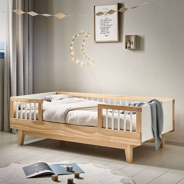 Toddler bed with guard rail from wood in natural from Petite Amélie