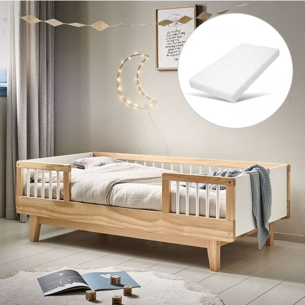 Toddler bed with guard rail from wood in natural with mattress from Petite Amélie