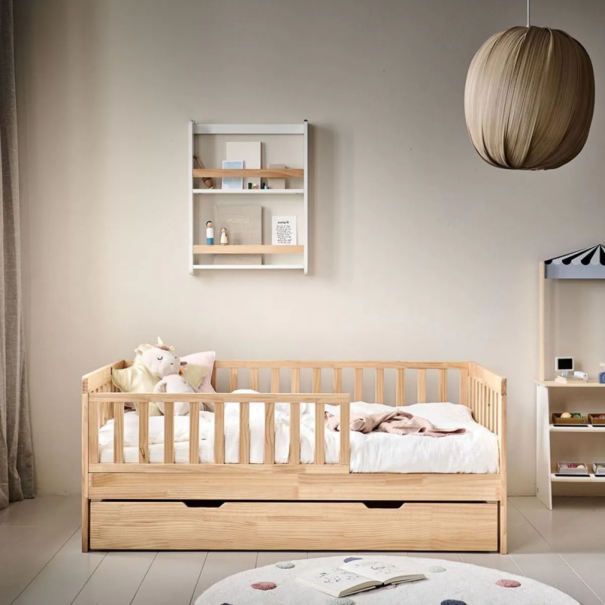 Toddler beds in natural wood at Petite Amélie